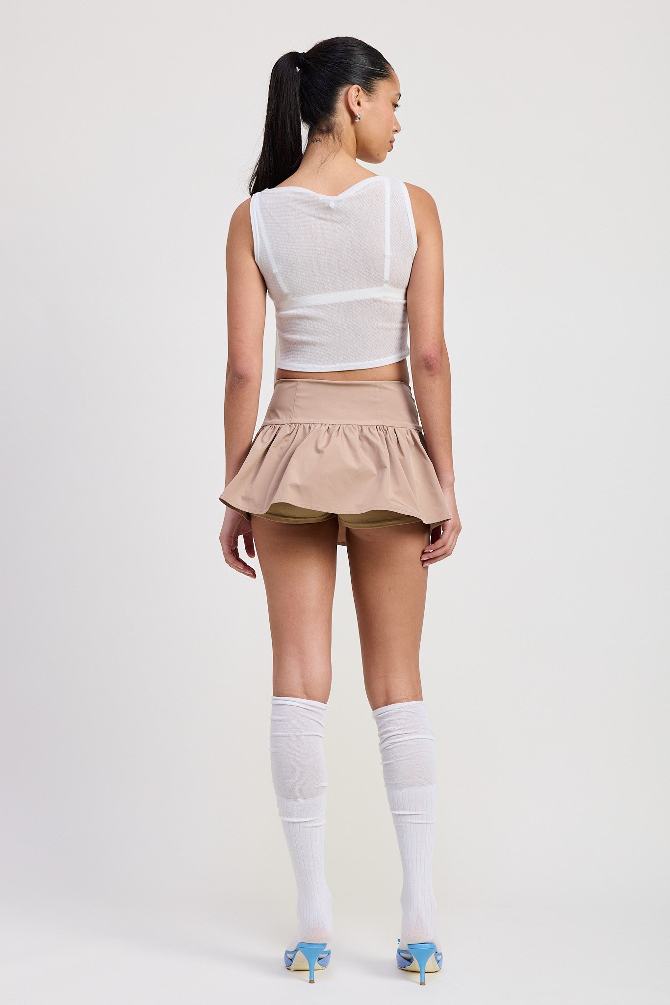 SLEEVELESS SHEER BOW TOP